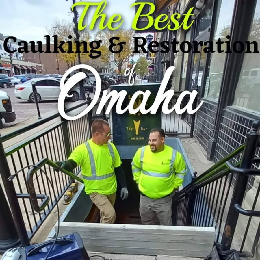 The Best Caulking & Restoration of Omaha crew in safety green on a downtown Omaha job site